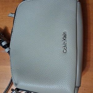 Calvin Klein Brenda Crossbody Bag Fawn Beige Vegan Leather Asymmetrical Zip Purs